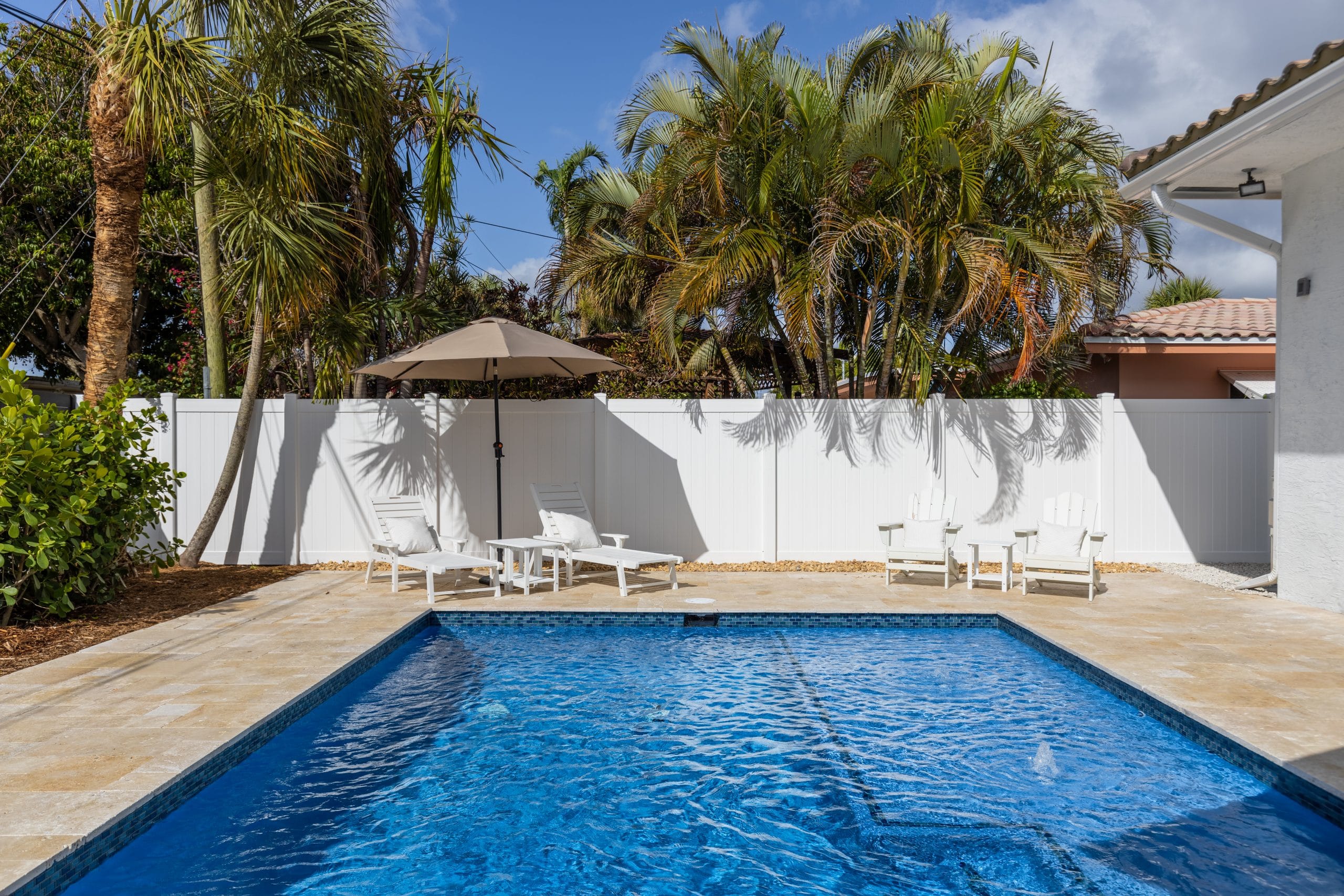 מידע מקצועי 9 modern building with swimming pool trees chairs landscape with blue sky scenic enviroment scaled